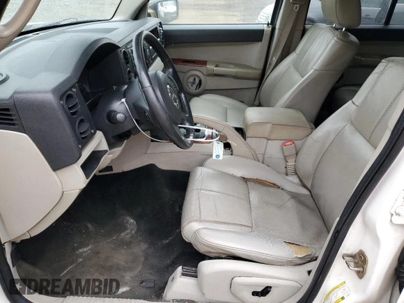 2006 Jeep Commander Limited with VIN 1J8HG58N76C305975, listed as a Copart auction lot 47113405 with 178,248 mi miles and Salvage title. Bid and sale history available at DreamBid. Image 7.
