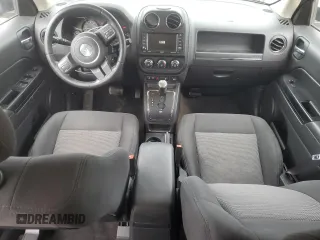 2014 Jeep Patriot Latitude with VIN 1C4NJRFB0ED649779, listed as a Copart auction lot 60444435 with 161,009 mi miles and Salvage title. Bid and sale history available at DreamBid. Image 8.