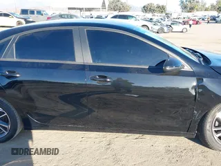 2023 Kia Forte LXS with VIN 3KPF24AD7PE680915, listed as a IAAI auction lot 40741003 with 16,770 mi miles and . Bid and sale history available at DreamBid. Image 13.