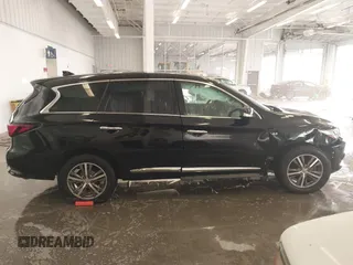 2020 Infiniti QX60 Pure with VIN 5N1DL0MN3LC533814, listed as a IAAI auction lot 41077349 with 79,377 mi miles and . Bid and sale history available at DreamBid. Image 14.