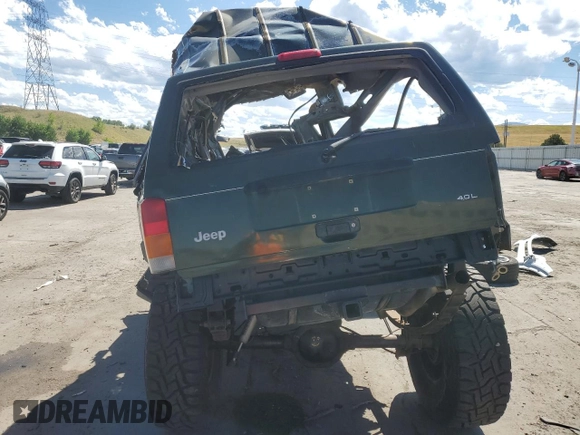 1998 Jeep Cherokee Sport with VIN 1J4FJ68S3WL237566, listed as a Copart auction lot 67380164 with 0 mi miles and Non Repairable. Bid and sale history available at carsss.com. Image 6.