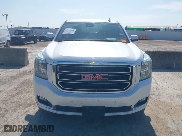 2017 GMC Yukon SLT z VIN 1GKS1BKC2HR378437, wystawiony jako IAAI lot #41923260 z przebiegiem 127 356 mil mil oraz . Historia ofert i sprzedaży dostępna na DreamBid. Obrazek 12.