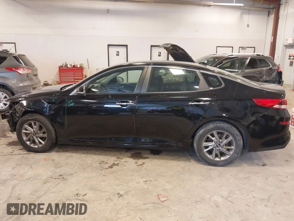 2019 Kia Optima LX with VIN 5XXGT4L31KG376856, listed as a IAAI auction lot 41427583 with 74,339 mi miles. Bid and sale history available at carsss.com. Image 14.