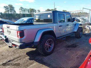 2020 Jeep Gladiator Rubicon with VIN 1C6JJTBG3LL146111, listed as a IAAI auction lot 41549848 with 60,054 mi miles. Bid and sale history available at carsss.com. Image 4.