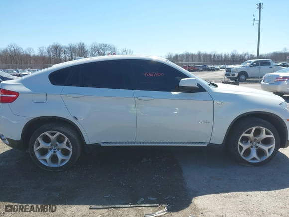 2011 BMW X6 35i with VIN 5UXFG2C58BLX07890, listed as a IAAI auction lot 42067800 with 144,367 mi miles. Bid and sale history available at carsss.com. Image 13.
