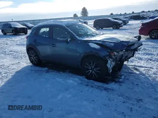 2018 Mazda CX-3 Touring with VIN JM1DKFC75J0309438, listed as a Copart auction lot 44071705 with 121,057 mi miles and Salvage Title. Bid and sale history available at carsss.com. Image 10.