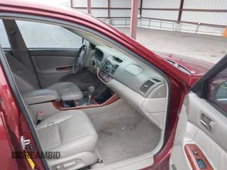 2003 Toyota Camry LE with VIN 4T1BE30K03U227243, listed as a IAAI auction lot 42063924 with 177,323 mi miles and . Bid and sale history available at DreamBid. Image 5.