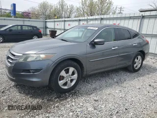 2010 Honda Crosstour EX z VIN 5J6TF1H39AL010570, wystawiony jako Copart lot #52414815 z przebiegiem 228 985 mil mil oraz Szkoda całkowita • Salvage title. Historia ofert i sprzedaży dostępna na DreamBid. Obrazek 1.
