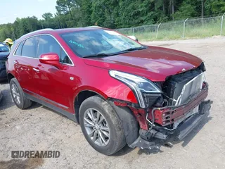 2021 Cadillac XT5 FWD Premium Luxury with VIN 1GYKNCRS6MZ214082, listed as a IAAI auction lot 42558689 with 51,855 mi miles and . Bid and sale history available at DreamBid. Image 1.