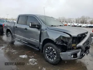 2018 Nissan Titan Pro-4X z VIN 1N6AA1E51JN536680, wystawiony jako Copart lot #82361724 z przebiegiem 98 699 mil mil oraz Szkoda całkowita • Salvage title. Historia ofert i sprzedaży dostępna na DreamBid. Obrazek 4.