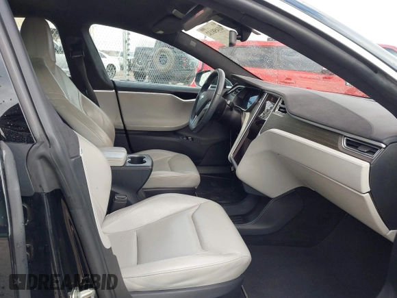 2016 Tesla Model S 70 with VIN 5YJSA1E11GF124965, listed as a IAAI auction lot 41458132 with Not provided miles and . Bid and sale history available at DreamBid. Image 5.
