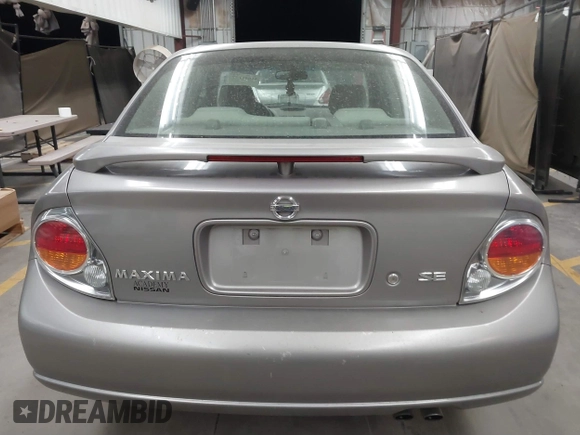 2002 Nissan Maxima GLE with VIN JN1DA31D32T422365, listed as a IAAI auction lot 41644137 with 165,157 mi miles and . Bid and sale history available at DreamBid. Image 16.