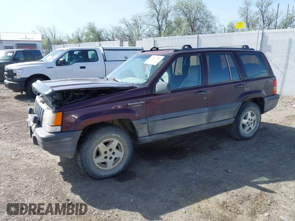 1994 Jeep Grand Cherokee Laredo with VIN 1J4GZ58Y2RC112641, listed as a IAAI auction lot 42212705 with 160,762 mi miles and . Bid and sale history available at DreamBid. Image 2.