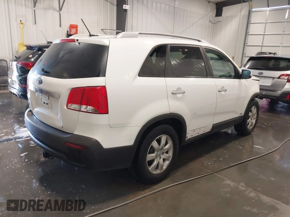 2013 Kia Sorento LX with VIN 5XYKTDA22DG310142, listed as a IAAI auction lot 41677417 with 234,661 mi miles. Bid and sale history available at carsss.com. Image 4.