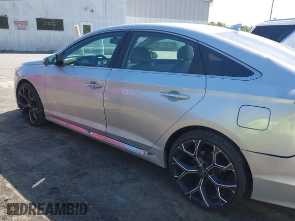 2015 Hyundai Sonata Sport with VIN 5NPE34AF6FH256579, listed as a IAAI auction lot 42052813 with 103,988 mi miles and . Bid and sale history available at DreamBid. Image 14.