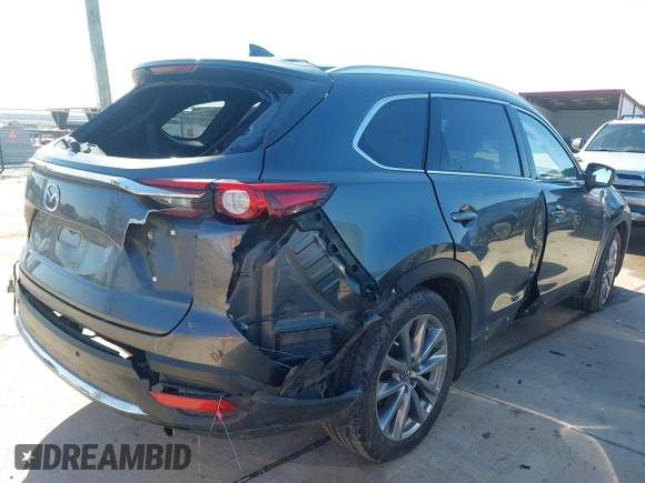 2019 Mazda CX-9 Grand Touring with VIN JM3TCADY8K0335429, listed as a IAAI auction lot 41203657 with 94,333 mi miles. Bid and sale history available at carsss.com. Image 4.