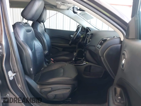 2021 Jeep Compass Limited with VIN 3C4NJDCB4MT565268, listed as a IAAI auction lot 41989761 with 97,368 mi miles and . Bid and sale history available at DreamBid. Image 5.
