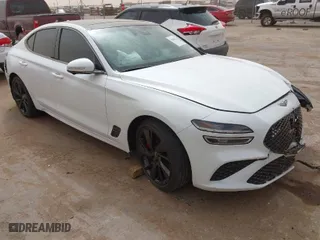 2023 Genesis G70 3.3T with VIN KMTG54TE3PU116344, listed as a IAAI auction lot 41808211 with 24,546 mi miles. Bid and sale history available at carsss.com. Image 1.