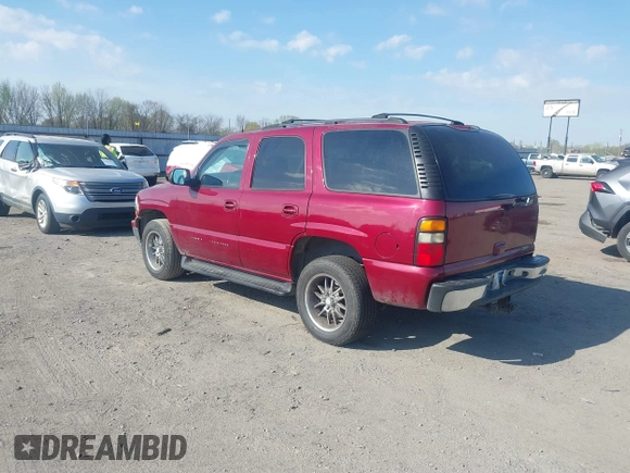 2004 Chevrolet Tahoe LS with VIN 1GNEC13T34J233824, listed as a IAAI auction lot 41877870 with 233,360 mi miles. Bid and sale history available at carsss.com. Image 3.