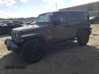 2018 Jeep Wrangler JK Unlimited Sport with VIN 1C4BJWDG9JL894502, listed as a Copart auction lot 89360855 with 100,944 mi miles and Salvage Title. Bid and sale history available at carsss.com. Image 1.