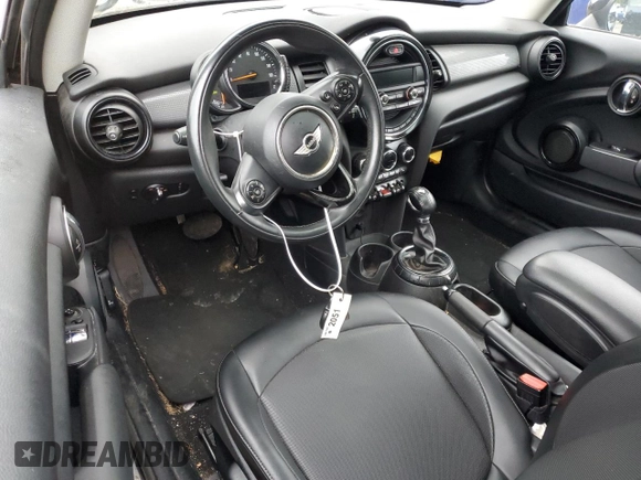 2014 MINI Hardtop with VIN WMWXM5C57ET932920, listed as a Copart auction lot 55810575 with 73,151 mi miles and Salvage title. Bid and sale history available at DreamBid. Image 8.