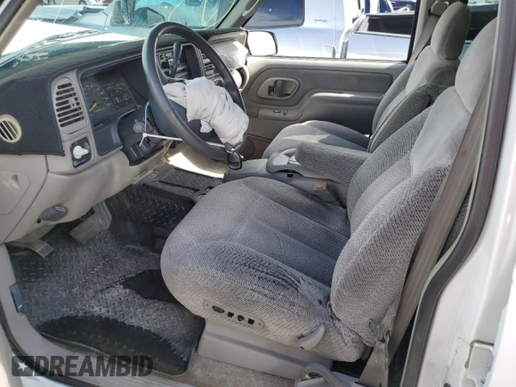1999 GMC Yukon with VIN 1GKEC13R4XJ809507, listed as a Copart auction lot 50922655 with 227,923 mi miles and Salvage Title. Bid and sale history available at carsss.com. Image 7.