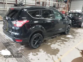 2018 Ford Escape SE with VIN 1FMCU9GD7JUD36295, listed as a IAAI auction lot 41855037 with 85,305 mi miles. Bid and sale history available at carsss.com. Image 4.