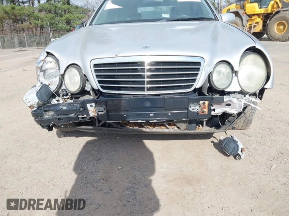 2000 Mercedes-Benz E-Class with VIN WDBJF82J0YX037784, listed as a IAAI auction lot 41768970 with 144,062 mi miles. Bid and sale history available at carsss.com. Image 6.