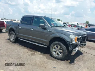 2019 Ford F-150 XL with VIN 1FTEW1E52KKE98899, listed as a IAAI auction lot 42576904 with 168,223 mi miles and . Bid and sale history available at DreamBid. Image 1.