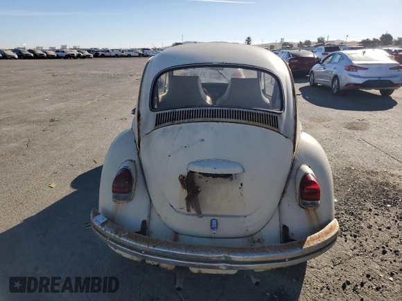1969 Volkswagen Beetle with VIN 1190494912, listed as a Copart auction lot 75495264 with 67,827 mi miles and Salvage Title. Bid and sale history available at DreamBid. Image 6.