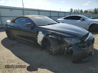 2013 BMW M6 z VIN WBSLZ9C56DDZ77892, wystawiony jako Copart lot #52102785 z przebiegiem 94 380 mil mil oraz Szkoda całkowita • Salvage title. Historia ofert i sprzedaży dostępna na DreamBid. Obrazek 4.