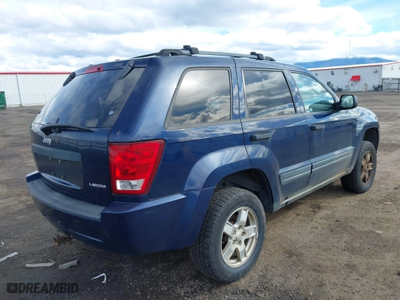 2005 Jeep Grand Cherokee Laredo with VIN 1J8GR48K45C534005, listed as a IAAI auction lot 41759692 with 211,566 mi miles. Bid and sale history available at carsss.com. Image 4.