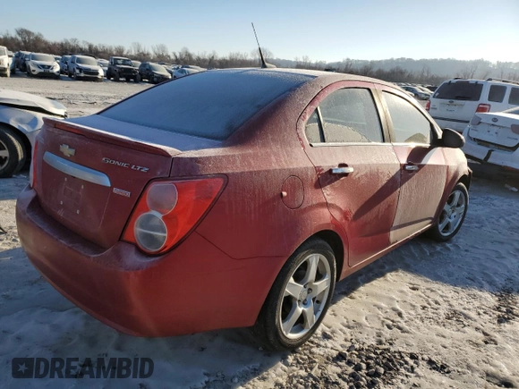 2014 Chevrolet Sonic LTZ with VIN 1G1JE5SB0E4229661, listed as a Copart auction lot 41872355 with 0 mi miles and Salvage Title. Bid and sale history available at carsss.com. Image 3.