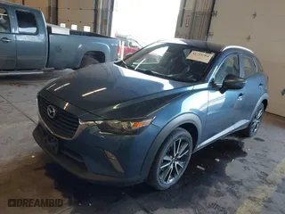 2018 Mazda CX-3 Touring with VIN JM1DKFC78J1323439, listed as a IAAI auction lot 41725784 with 134,055 mi miles. Bid and sale history available at carsss.com. Image 2.