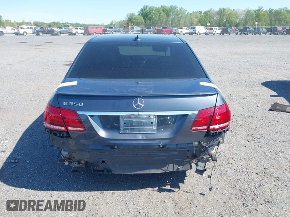 2014 Mercedes-Benz E 350 Sport with VIN WDDHF5KB8EA985121, listed as a IAAI auction lot 42124448 with 96,412 mi miles and . Bid and sale history available at DreamBid. Image 16.