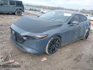 2019 Mazda Mazda3 Hatchback w/Premium Pkg with VIN JM1BPBNM0K1129087, listed as a IAAI auction lot 41684667 with 123,000 mi miles. Bid and sale history available at carsss.com. Image 2.