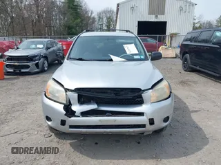 2007 Toyota RAV4 with VIN JTMBD35V075109123, listed as a IAAI auction lot 42107927 with 201,396 mi miles. Bid and sale history available at carsss.com. Image 6.