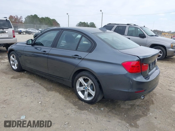 2014 BMW 3 Series 328d xDrive with VIN WBA3D5C59EKX96701, listed as a IAAI auction lot 40716972 with 163,775 mi miles. Bid and sale history available at carsss.com. Image 3.