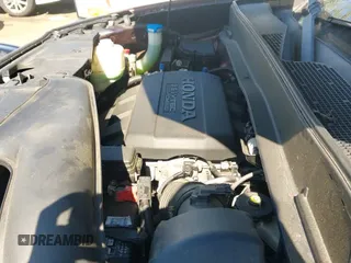 2012 Honda Pilot Touring with VIN 5FNYF4H98CB054812, listed as a IAAI auction lot 43136171 with 109,495 mi miles and . Bid and sale history available at DreamBid. Image 19.