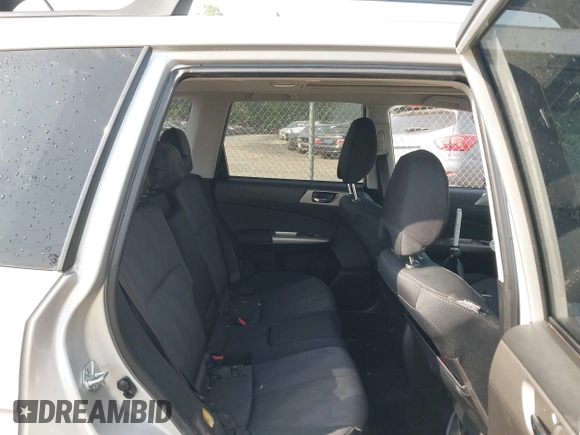 2009 Subaru Forester X with VIN JF2SH63699H720644, listed as a IAAI auction lot 42163727 with 141,503 mi miles and . Bid and sale history available at DreamBid. Image 8.