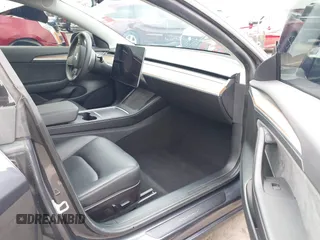 2022 Tesla Model 3 Long Range with VIN 5YJ3E1EB9NF164774, listed as a IAAI auction lot 41915755 with 39,625 mi miles and . Bid and sale history available at DreamBid. Image 5.