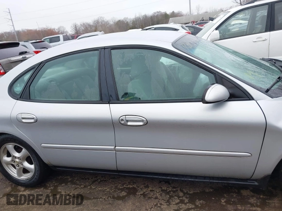 2003 Ford Taurus SE Standard with VIN 1FAFP53273G132268, listed as a IAAI auction lot 41790335 with 202,724 mi miles. Bid and sale history available at carsss.com. Image 13.