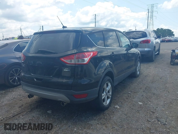 2013 Ford Escape SE with VIN 1FMCU9G95DUC56302, listed as a IAAI auction lot 42553915 with 151,390 mi miles and . Bid and sale history available at DreamBid. Image 4.