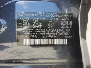 2017 Hyundai Santa Fe 2.4L z VIN 5NMZUDLB7HH028678, wystawiony jako Copart lot #57557855 z przebiegiem 102 049 mil mil oraz Szkoda całkowita • Salvage title. Historia ofert i sprzedaży dostępna na DreamBid. Obrazek 13.