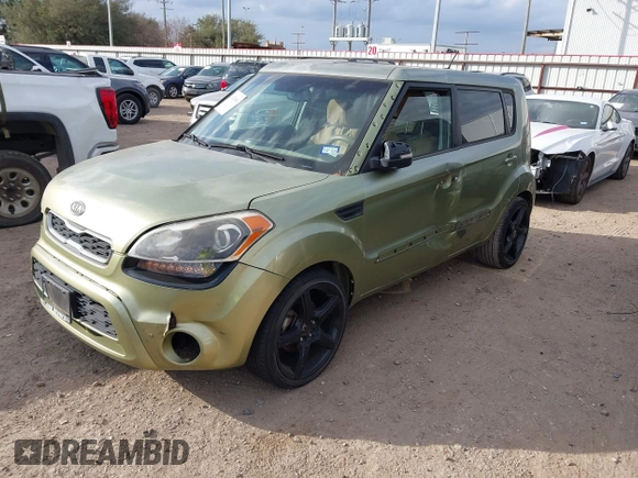 2012 Kia Soul + with VIN KNDJT2A69C7398380, listed as a IAAI auction lot 41523001 with 128,583 mi miles. Bid and sale history available at carsss.com. Image 2.