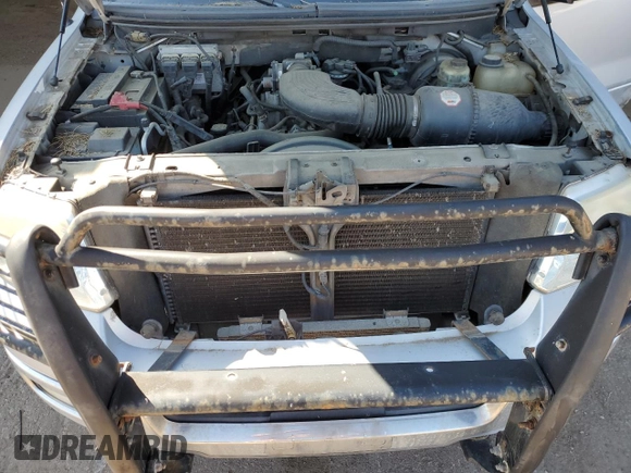 2004 Ford F-150 STX z VIN 1FTRX12WX4FA01069, wystawiony jako Copart lot #71503874 z przebiegiem 241 284 mil mil oraz Czysty tytuł • Clean title. Historia ofert i sprzedaży dostępna na DreamBid. Obrazek 11.