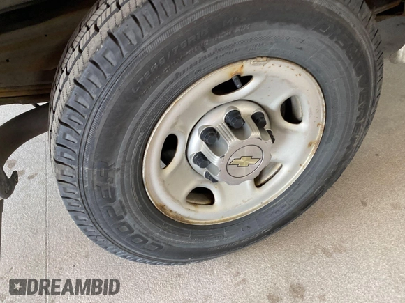 2014 Chevrolet Express Cargo with VIN 1GCWGFCA2E1184095, listed as a IAAI auction lot 42725036 with 270,636 mi miles and . Bid and sale history available at DreamBid. Image 6.