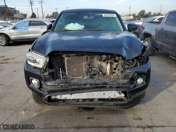 2017 Toyota Tacoma SR5 with VIN 3TMDZ5BN2HM030199, listed as a Copart auction lot 82649564 with 68,144 mi miles and Salvage Title. Bid and sale history available at carsss.com. Image 5.