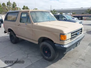 1988 Ford Bronco Eddie Bauer with VIN 1FMEU15N3JLA98943, listed as a IAAI auction lot 42771847 with 41,662 mi miles and . Bid and sale history available at DreamBid. Image 1.