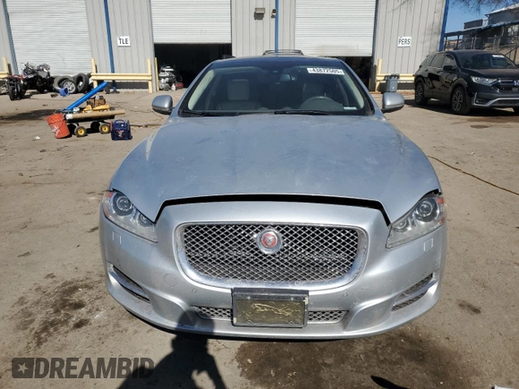 2014 Jaguar XJ Portfolio with VIN SAJWA2GZ2E8V70065, listed as a Copart auction lot 43872505 with 138,677 mi miles and Salvage title. Bid and sale history available at DreamBid. Image 5.